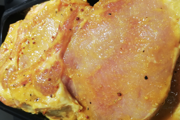 Pork steak in Honey-mustard marinade (mustard, lemon, turmeric, black pepper, garlic, onion)
